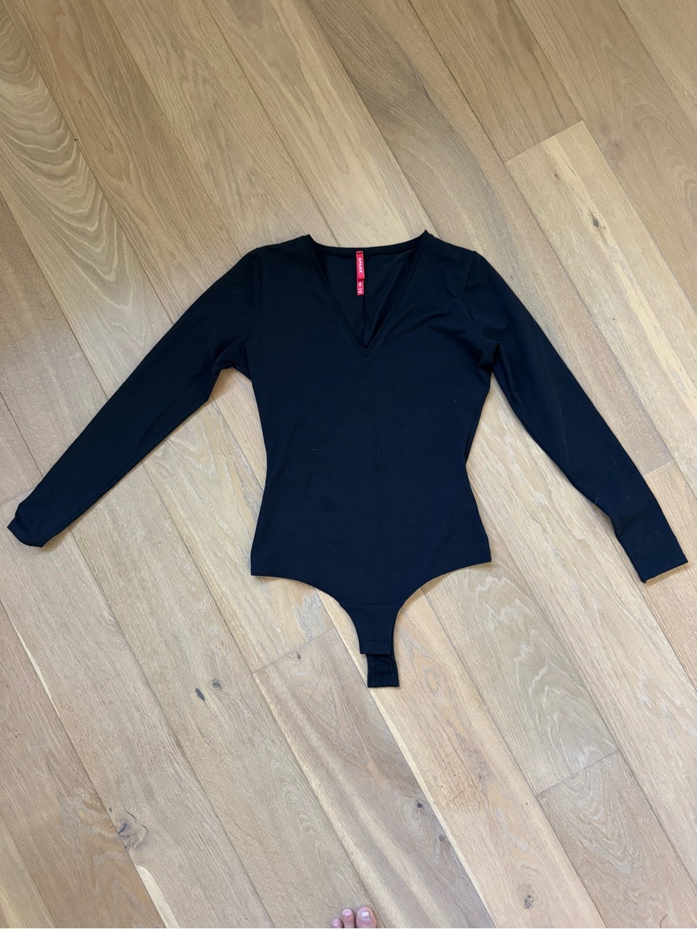 SPANX Black Long-Sleeve V-Neck Bodysuit